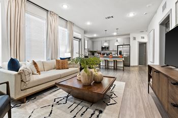 a living room with a couch and a table